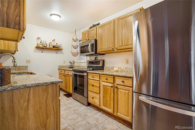 1152 S Yosemite Way Unit 29, Denver, CO 80247 - kitchen with stainless steel appliances, open shelves, light tile patterned flooring, and light stone counters