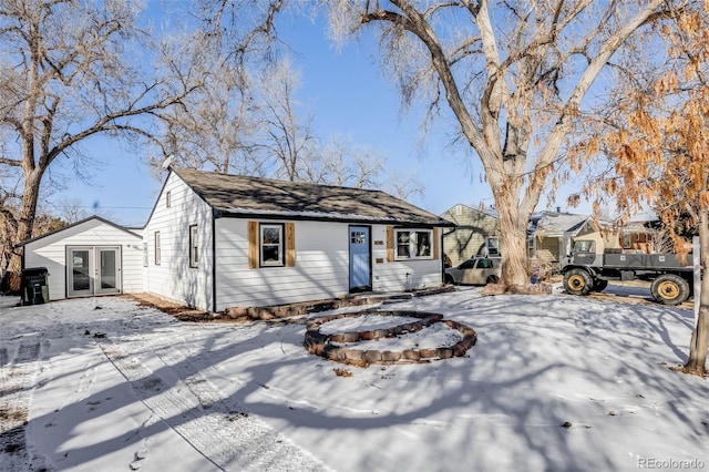 single story home featuring french doors