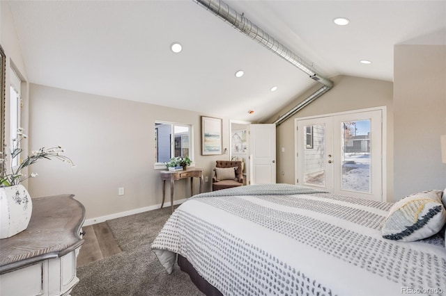 bedroom featuring vaulted ceiling, wood-type flooring, and french doors