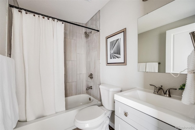 full bathroom with vanity, toilet, and shower / bath combo with shower curtain