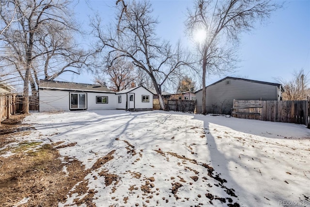 view of snow covered property