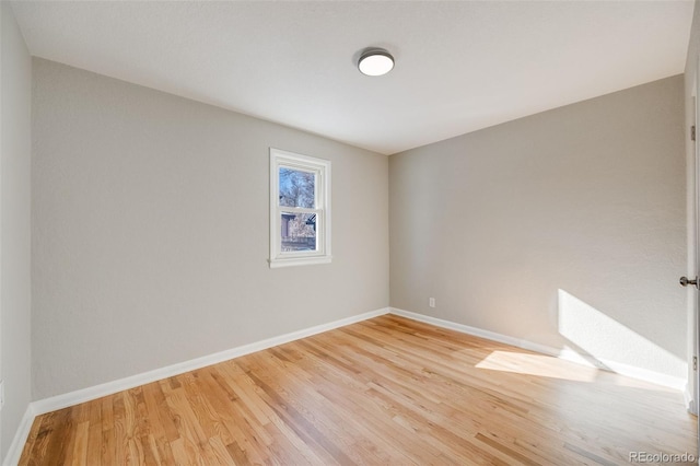 unfurnished room featuring light wood-type flooring