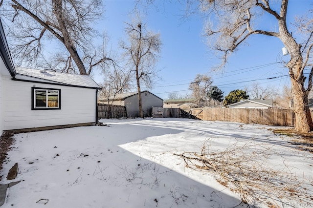 view of yard covered in snow