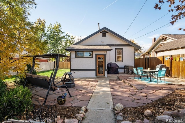 back of house featuring a patio