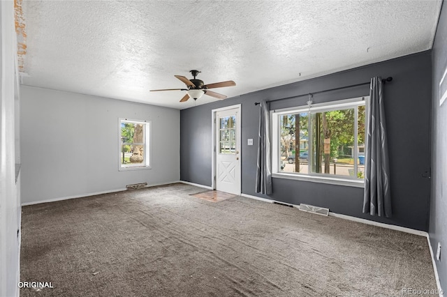 5481 Leyden St, Commerce City, CO 80022 - carpeted empty room featuring a ceiling fan and a textured ceiling