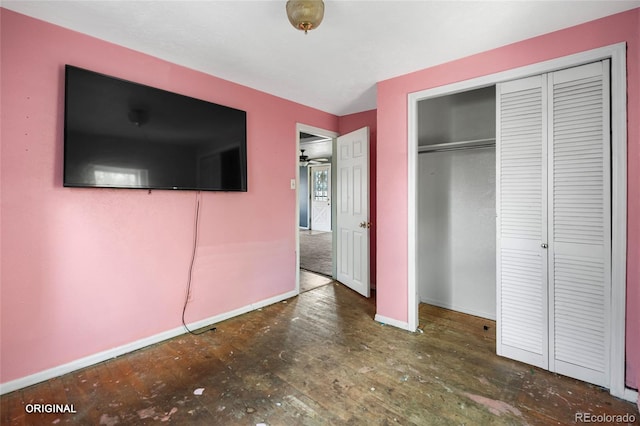 5481 Leyden St, Commerce City, CO 80022 - unfurnished bedroom featuring a closet and wood finished floors