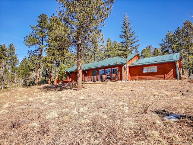 view of front of property featuring metal roof