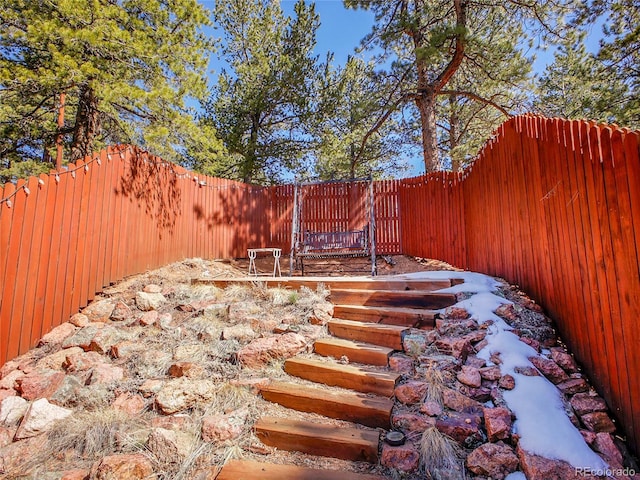 view of yard with a fenced backyard