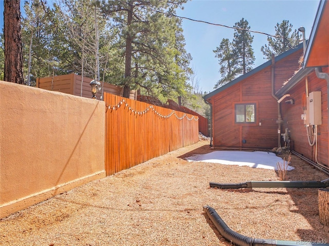 view of yard with fence