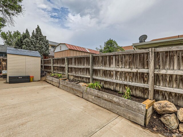 380 S 25th Ave, Brighton, CO 80601 - fenced backyard with a patio area