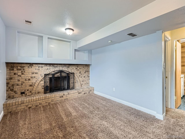 380 S 25th Ave, Brighton, CO 80601 - unfurnished living room featuring carpet floors, a fireplace, and baseboards