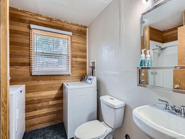 380 S 25th Ave, Brighton, CO 80601 - full bathroom with wood walls, a sink, and toilet