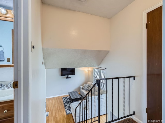 380 S 25th Ave, Brighton, CO 80601 - stairway with wood finished floors and baseboards