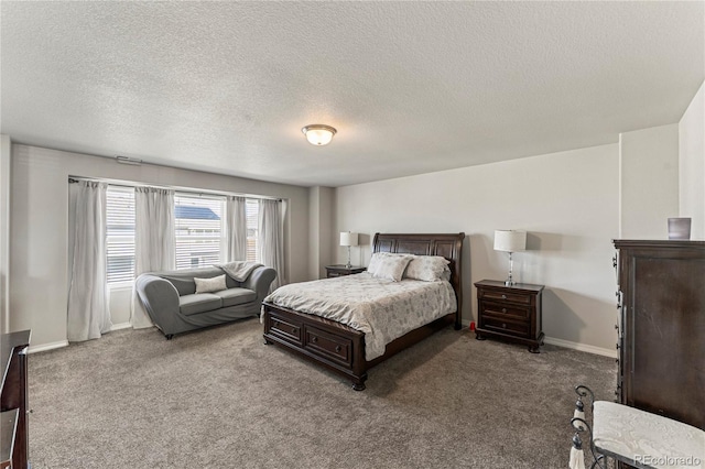 bedroom featuring carpet, a textured ceiling, and baseboards