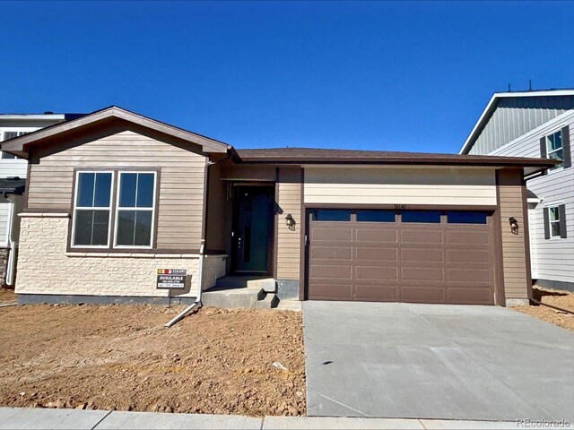 view of front of house with a garage and driveway