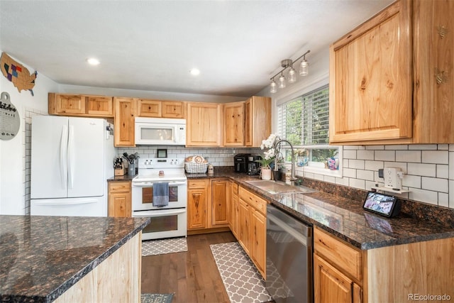 12296 Birch St, Thornton, CO 80241 - kitchen with white appliances, dark wood finished floors, tasteful backsplash, light brown cabinets, and recessed lighting