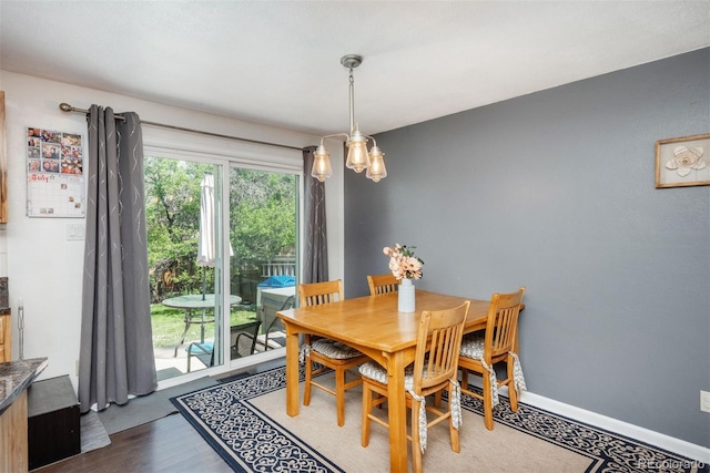 12296 Birch St, Thornton, CO 80241 - dining space with wood finished floors and baseboards