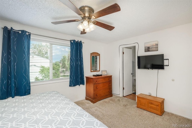 12296 Birch St, Thornton, CO 80241 - bedroom featuring carpet floors, ceiling fan, and a textured ceiling