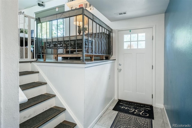 12296 Birch St, Thornton, CO 80241 - doorway with healthy amount of natural light and stairway