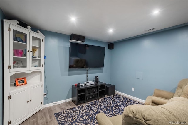 12296 Birch St, Thornton, CO 80241 - living area featuring light wood-type flooring and recessed lighting