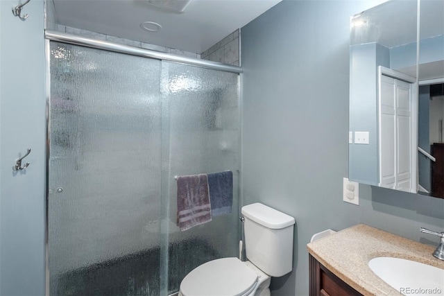 12296 Birch St, Thornton, CO 80241 - bathroom with vanity and a shower with shower door
