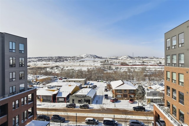 property's view of city featuring a mountain view