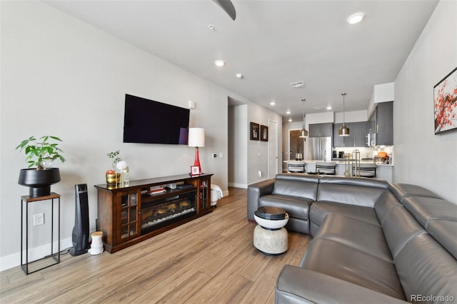 living room featuring light wood-type flooring