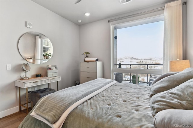 bedroom featuring hardwood / wood-style flooring