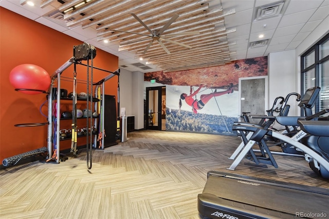 workout area featuring a drop ceiling