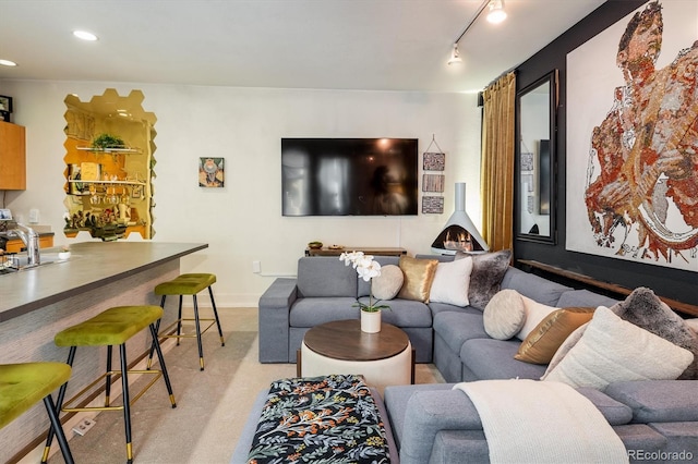 801 Confidence Dr Unit 2, Longmont, CO 80504 - living area featuring light colored carpet, recessed lighting, and rail lighting
