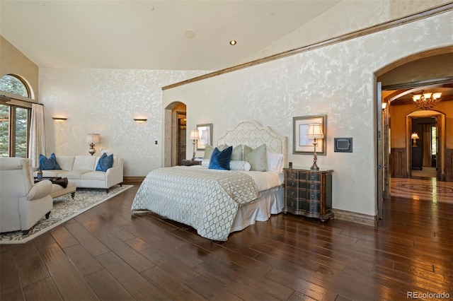 bedroom featuring dark hardwood / wood-style floors and vaulted ceiling