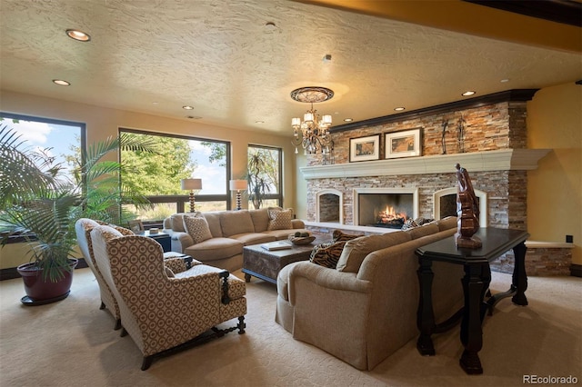 carpeted living room with a textured ceiling, a fireplace, and a chandelier