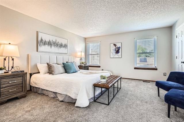 6367 Xavier St, Arvada, CO 80003 - bedroom with carpet floors, multiple windows, a textured ceiling, and baseboards