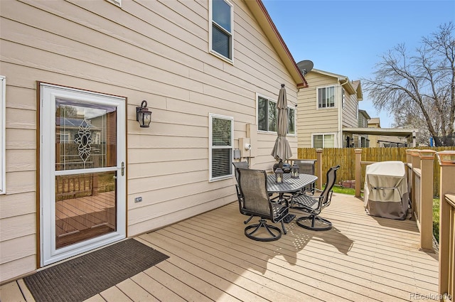 6367 Xavier St, Arvada, CO 80003 - wooden terrace with outdoor dining area