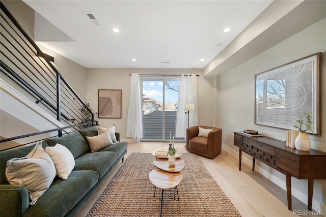 1473 N Locust, Denver, CO 80220 - living room with light wood-type flooring, recessed lighting, and stairs