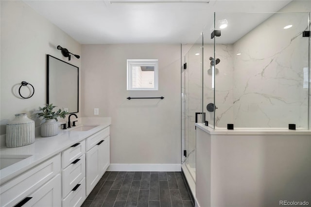 1473 N Locust, Denver, CO 80220 - bathroom with a marble finish shower, double vanity, and wood finished floors