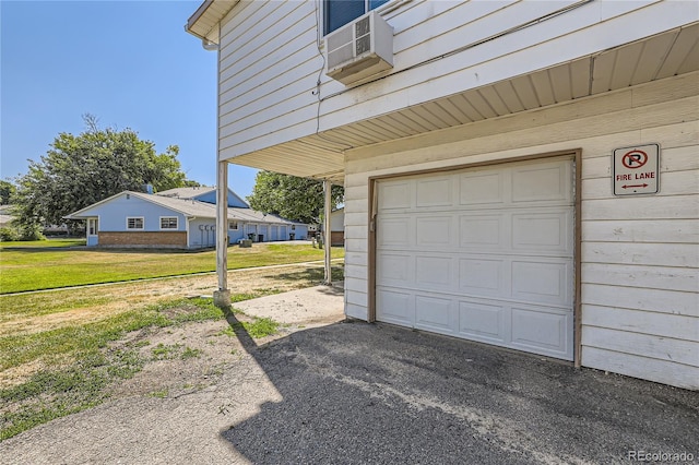 garage featuring driveway