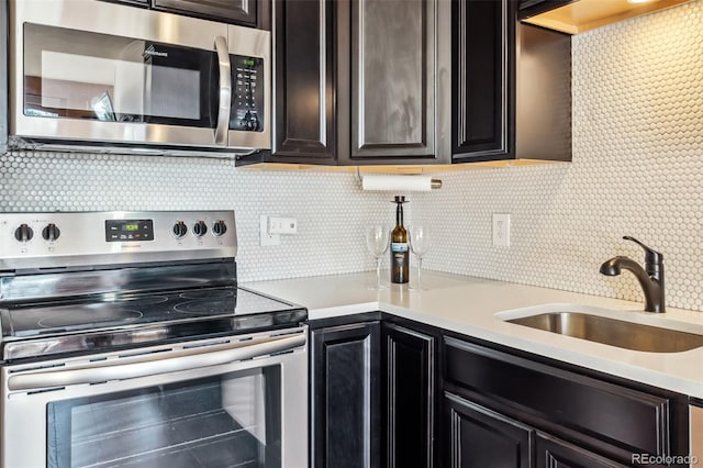 91400 Ryan Gulch Rd Unit 91406B, Silverthorne, CO 80498 - kitchen with stainless steel appliances, tasteful backsplash, and light countertops