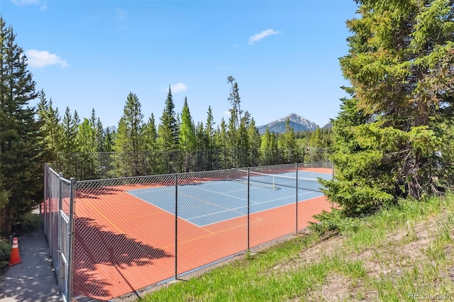 91400 Ryan Gulch Rd Unit 91406B, Silverthorne, CO 80498 - view of tennis court featuring a mountain view