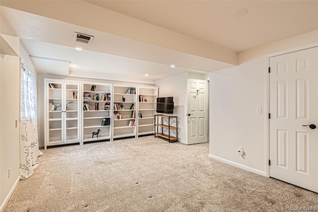 interior space with baseboards and visible vents