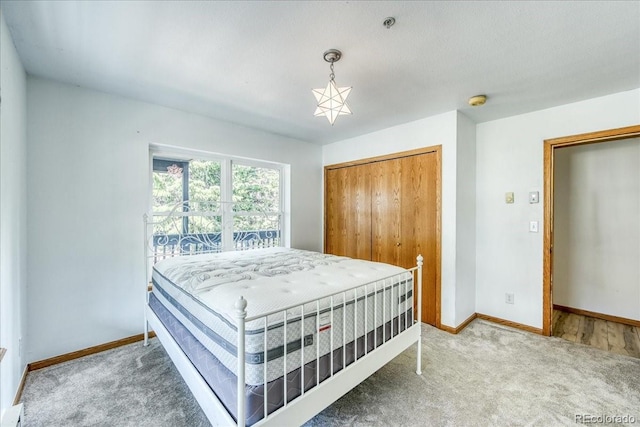 234 Carroll Ln, Breckenridge, CO 80424 - carpeted bedroom with baseboards and a closet