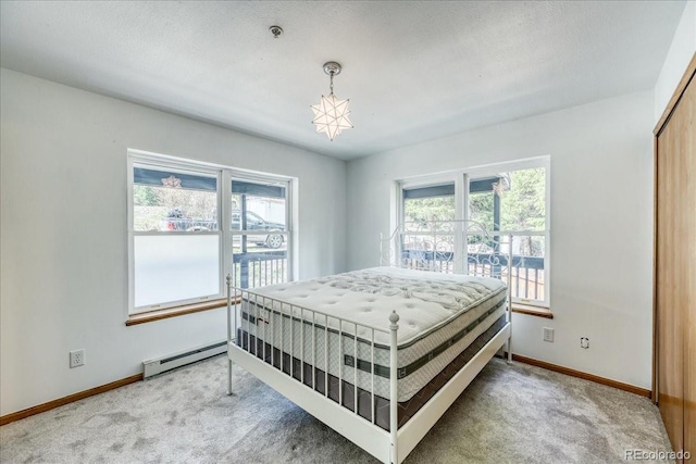 234 Carroll Ln, Breckenridge, CO 80424 - carpeted bedroom featuring a baseboard radiator and baseboards