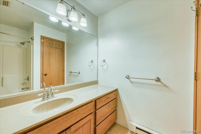 234 Carroll Ln, Breckenridge, CO 80424 - bathroom with vanity, bathing tub / shower combination, and a baseboard heating unit