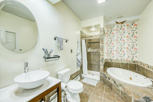 234 Carroll Ln, Breckenridge, CO 80424 - bathroom featuring a jetted tub, a stall shower, tile patterned floors, and vanity