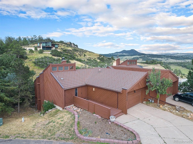 exterior space featuring a mountain view