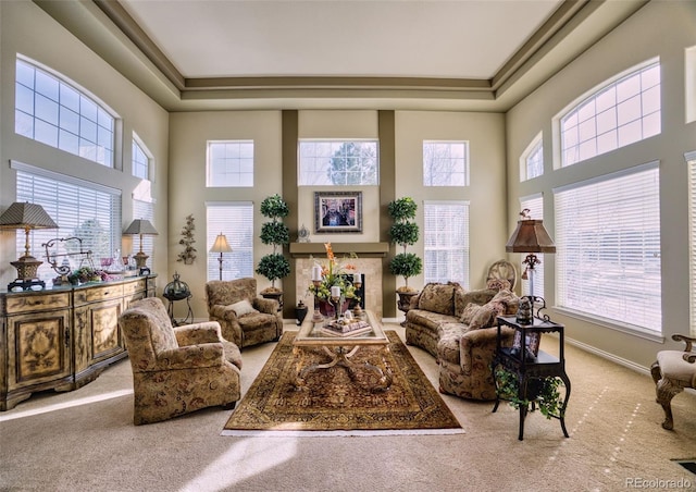 sunroom featuring a fireplace