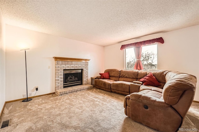 3823 S Uravan St, Aurora, CO 80013 - living room with carpet flooring, a textured ceiling, a brick fireplace, and baseboards