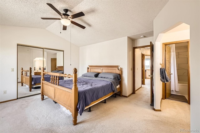 3823 S Uravan St, Aurora, CO 80013 - bedroom featuring light carpet, lofted ceiling, baseboards, a ceiling fan, and a textured ceiling