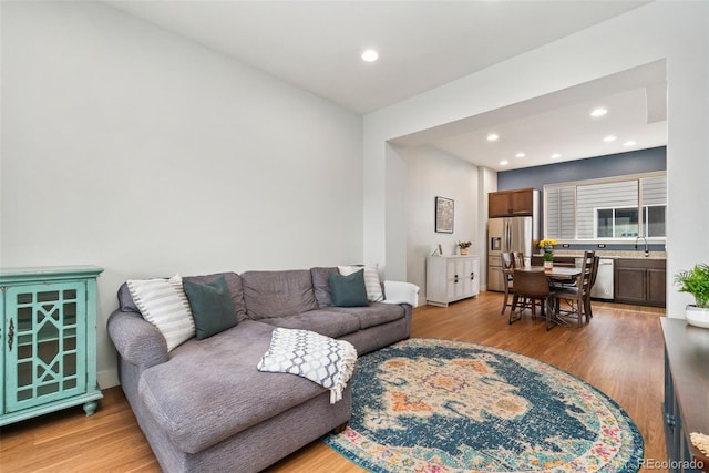 7808 W 43rd Pl, Wheat Ridge, CO 80033 - living area with recessed lighting and light wood finished floors