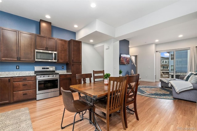 7808 W 43rd Pl, Wheat Ridge, CO 80033 - dining space featuring light wood-type flooring, baseboards, and recessed lighting